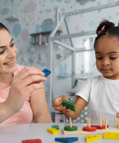 child with teacher